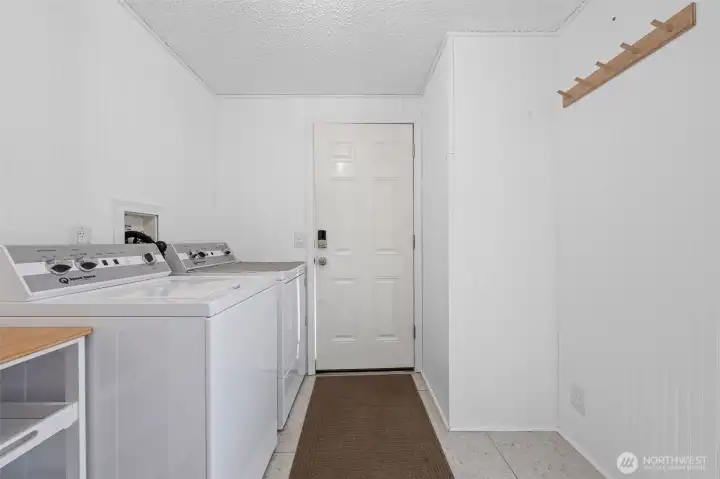 Laundry area just off the back door