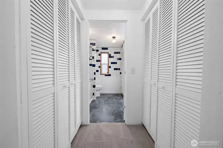 Closets on both sides as you walk into the masterr bath