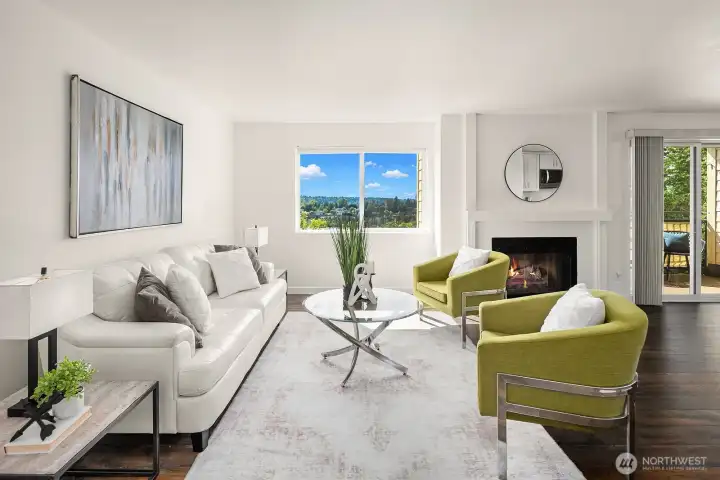 Another angle of the sun-filled living space showcasing the seamless flow, contemporary furnishings, and breathtaking views that make this room truly special. Another angle of the sun-filled living space showcasing the seamless flow, contemporary furnishings, and breathtaking views that make this room truly special.