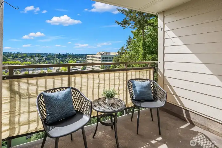 Private balcony retreat showcasing breathtaking views of the Seattle skyline and Olympic Mountains, the perfect spot to relax and unwind. Private balcony retreat showcasing breathtaking views of the Seattle skyline and Olympic Mountains, the perfect spot to relax and unwind.