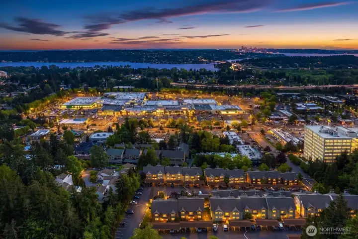 Impressive aerial view of the Factoria neighborhood at dusk, showcasing the vibrant shopping, dining, and entertainment options just steps from your door. Impressive aerial view of the Factoria neighborhood at dusk, showcasing the vibrant shopping, dining, and entertainment options just steps from your door.