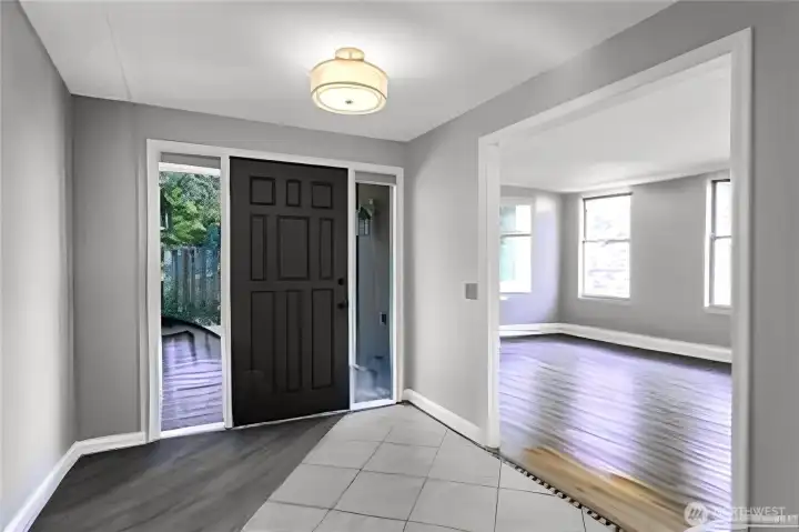 Open and bright entry with tile floor, large coat closet, and easy access to the living and dining room. Open and bright entry with tile floor, large coat closet, and easy access to the living and dining room.