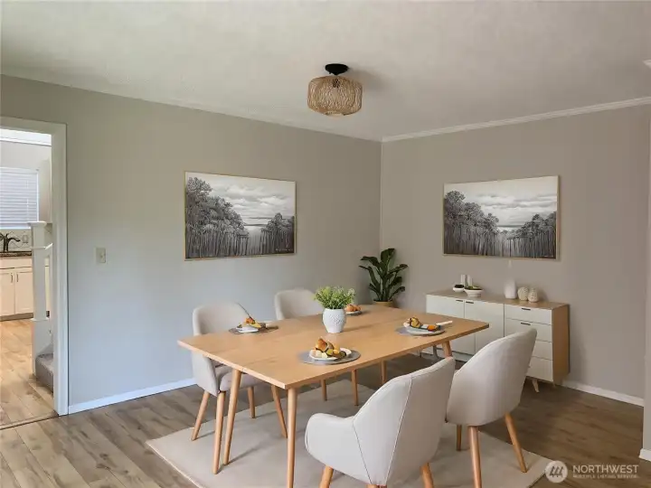 The dining room is conveniently located off the kitchen. The dining room is conveniently located off the kitchen.