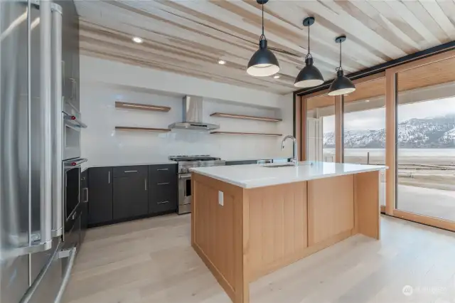 Main floor kitchen with large nesting sliding door