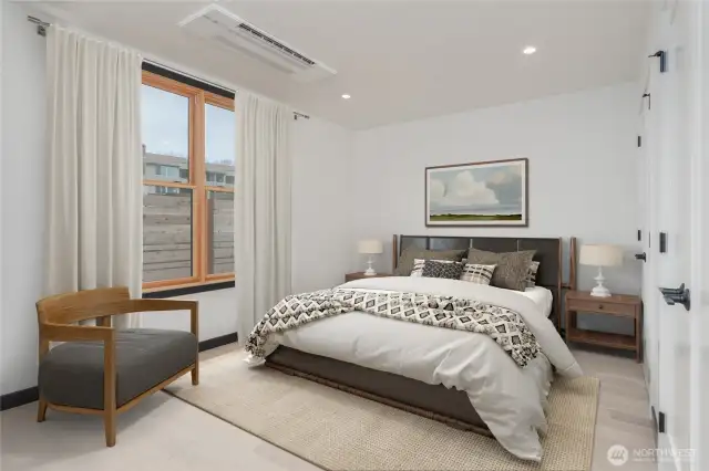 Virtually staged - Main floor primary bedroom with ensuite bathroom