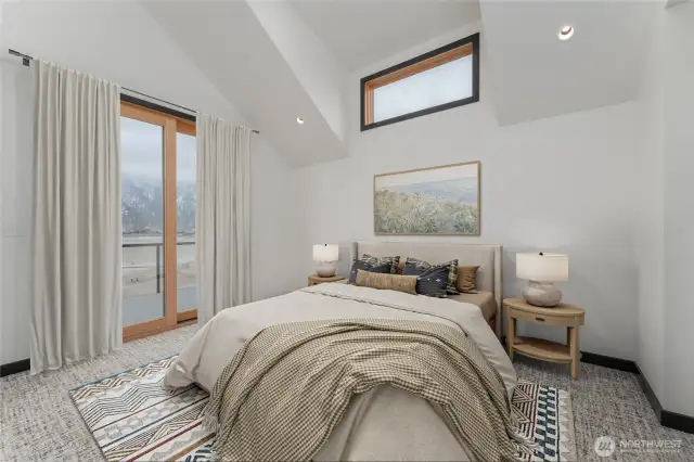Virtually staged - Upstairs primary bedroom with balcony, ensuite bathroom with heated floors and walk in shower