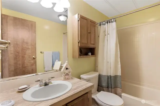 This is the second of two gleaming full bathrooms. The other one, off the primary bedroom has a new safety step-in tub you'll love!