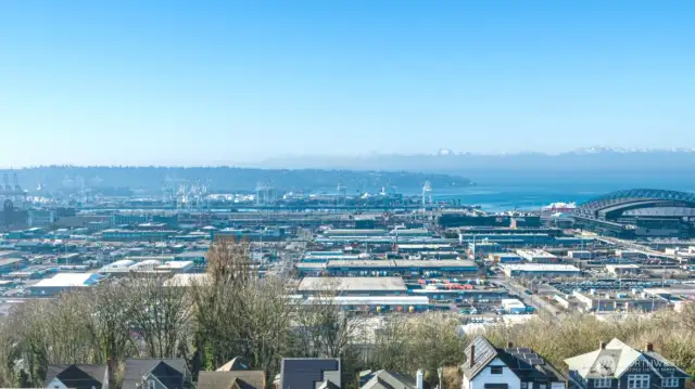 A stunning view of Harbor Island and West Seattle, Elliott Bay and the mountains!