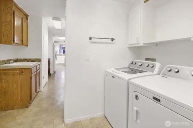 Laundry room near garage entrance.