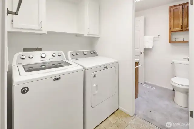 Laundry next to guest bath.