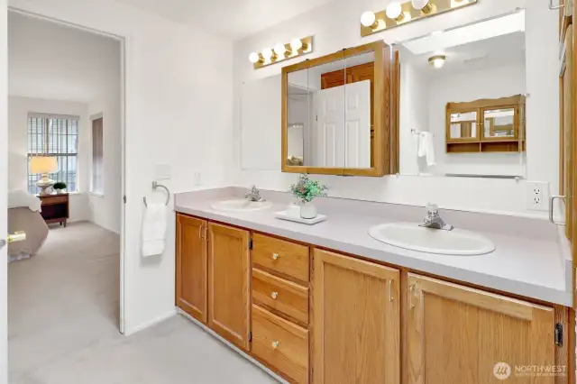 Primary bath with double sink vanity.