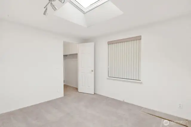 2nd bedroom with skylight.