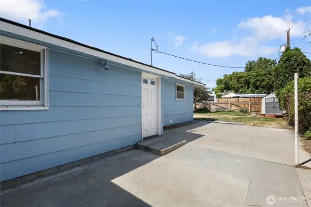 Back patio - exterior door that goes into mudroom with kitchen, garage or downstairs access