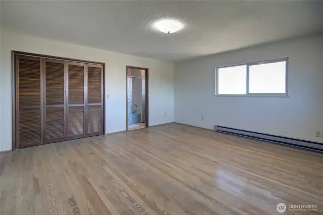 Primary bedroom is spacious and has two closets