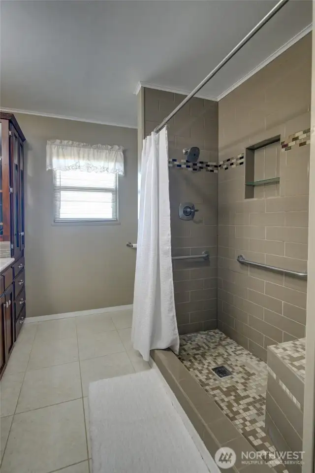 Hallway bathroom with walk in shower