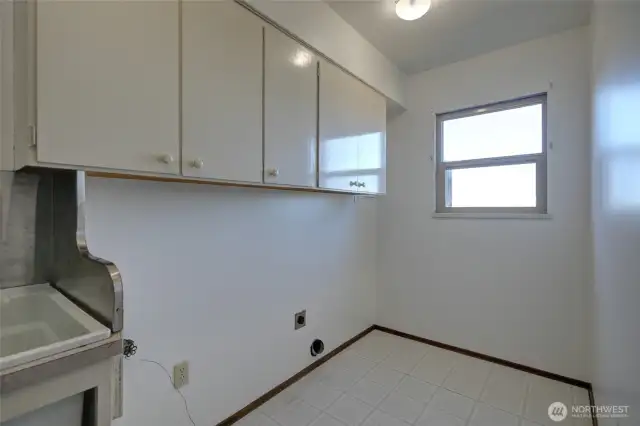 Laundry room has a utility sink
