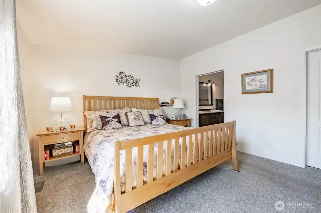Primary bedroom with large closets and en-suite.