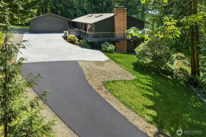 Freshly paved road leading up to the house