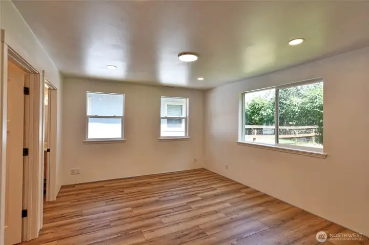 Spacious primary bedroom with walk-icloset and full bath