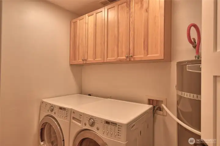 Laundry room includes washer and dryer