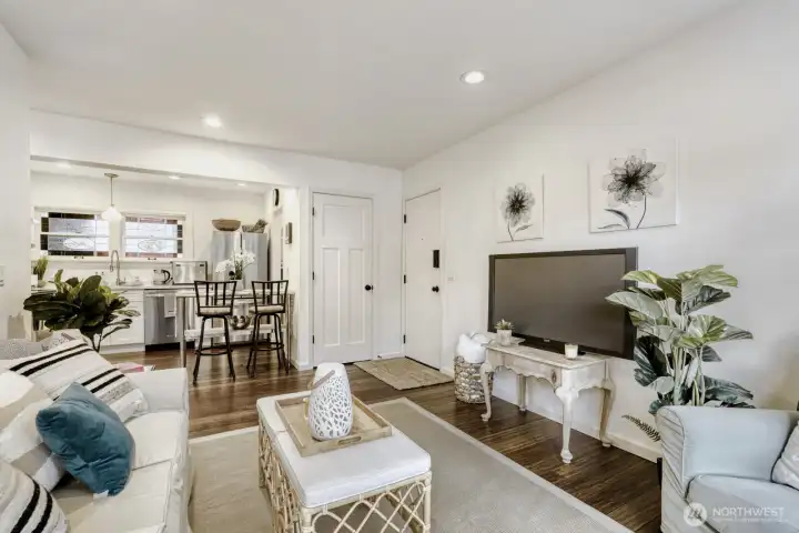 Open concept looks into kitchen/dining area