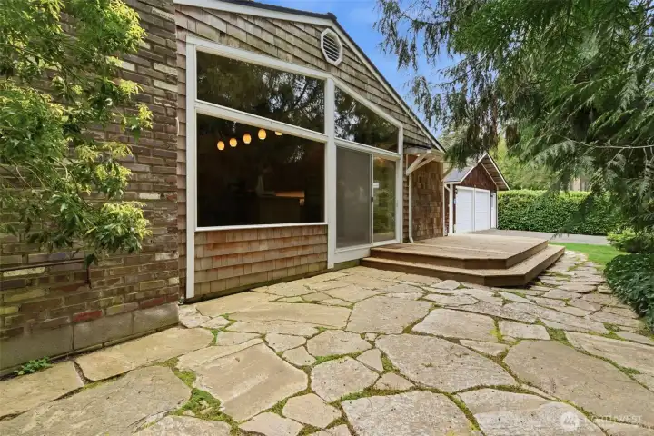 The living room side of this home has a convenient access to a patio area.  The large  window/slider let's in natural light.