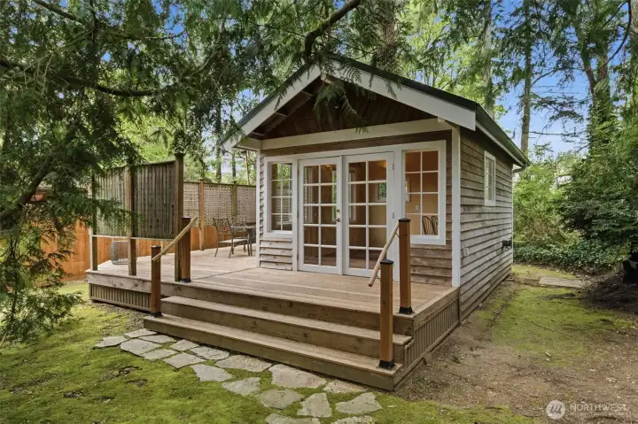 On the back of the property (included 3rd parcel) is a private get-a-way cottage/office/flex space.  Keep clicking on the photos to see the charming interior.