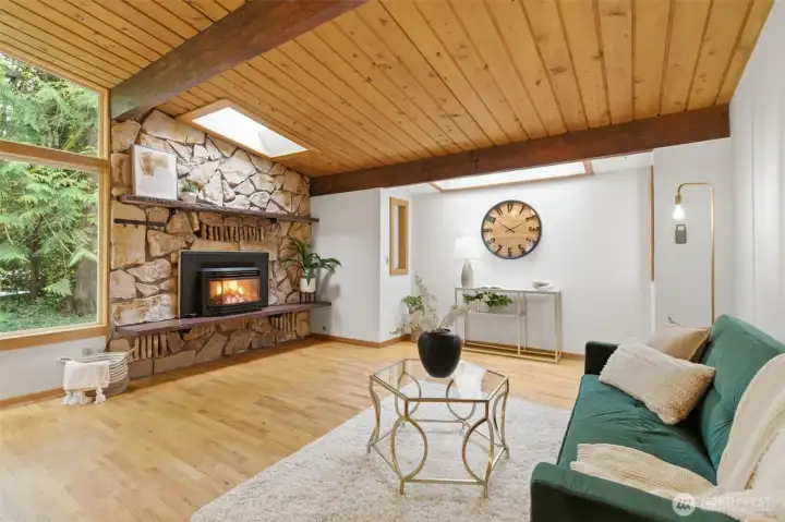 Spacious Living Room, with beautiful, vaulted, tongue and groove ceiling.