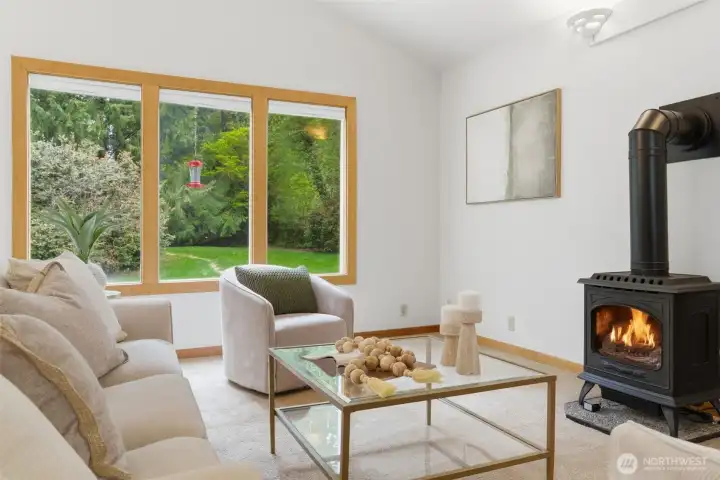 Cozy propane fireplace keeps this space nice and warm.