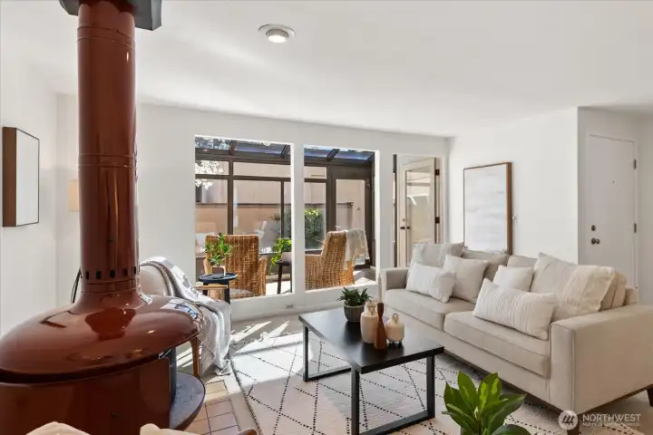 Living room with cozy woodburning fireplace