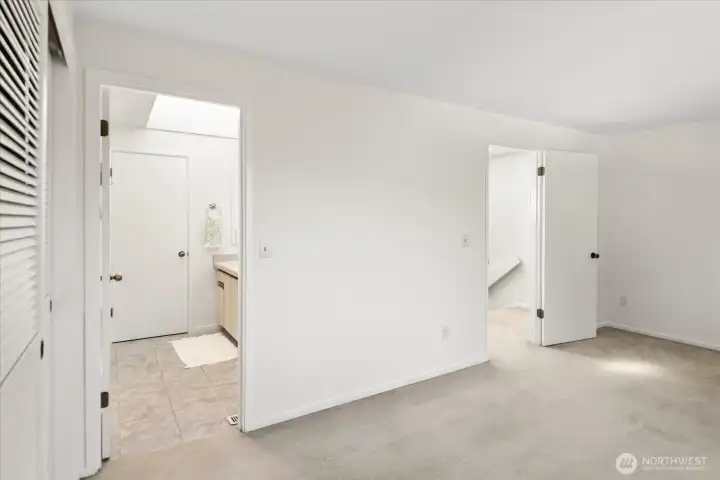 2nd large bedroom on upper level with door to full bath