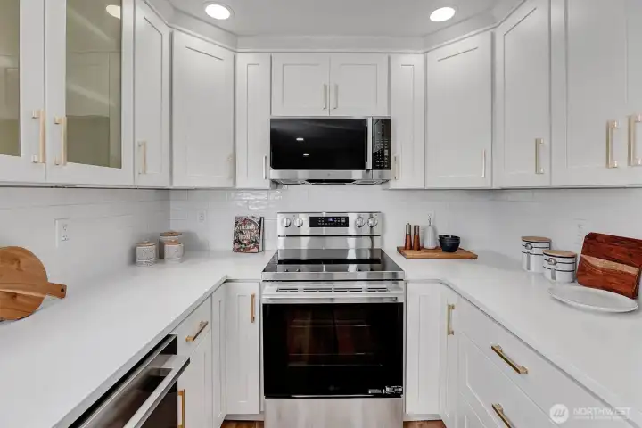 Kitchen features tile backsplash.