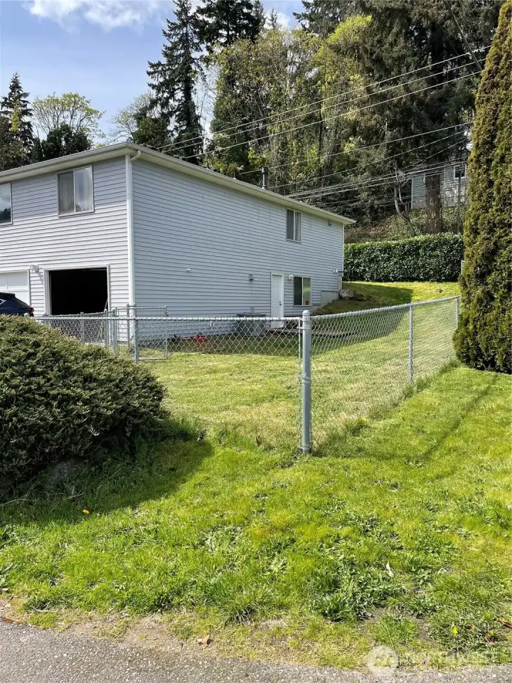 Yard looking W toward Adele from 9th