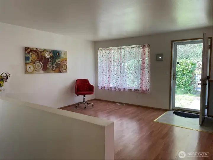 stairwell to lower level at far left