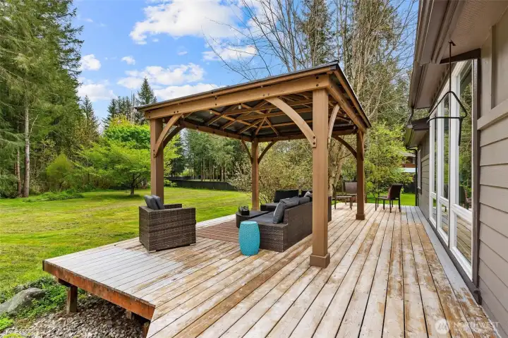 Sit under your cabana and overlook the beauty and privacy of your backyard.