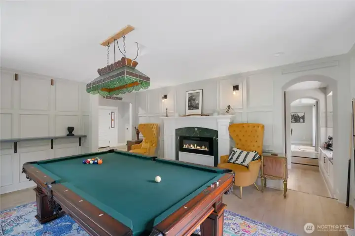 Living Room. Seller is leaving behind pool table! Living Room. Seller is leaving behind pool table!