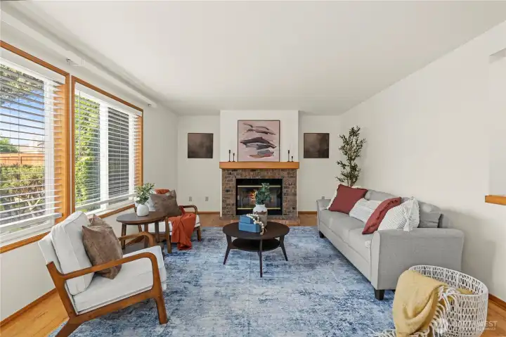 2nd living room with wood burning fireplace.
