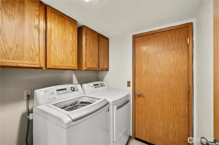 Laundry/mudroom on main level right off garage.