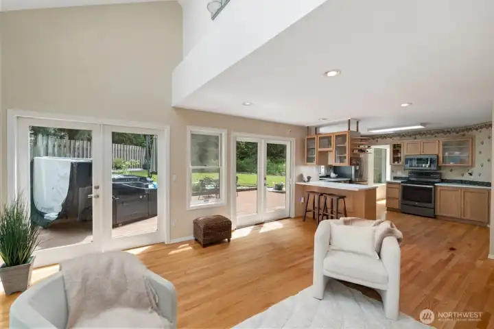 Wonderfully large family room has a vaulted ceiling area that includes lighting and 3 skylights which includes one that opens.