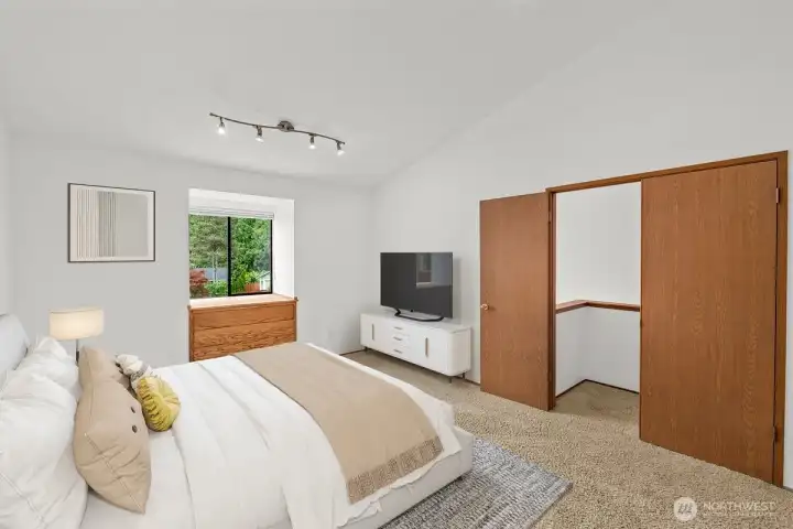 Another view of the virtually staged primary bedroom.