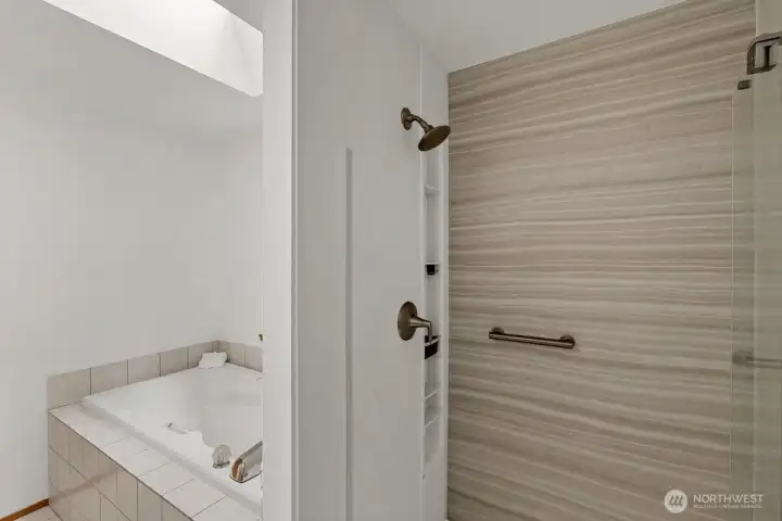 Updated separate shower in the primary en-suite.