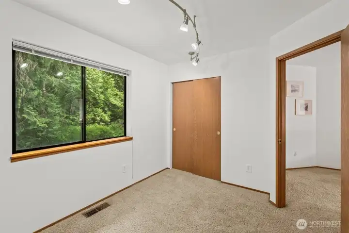 Second bedroom overlooking the back yard.