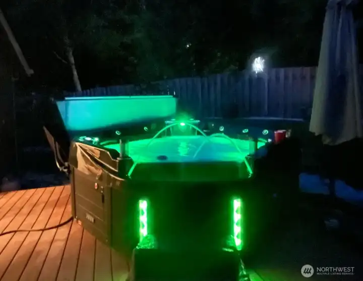 The hot tub has many options - turn on the music or fountain jets!