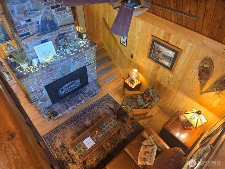 You can still enjoy the living room and fire place from the loft.