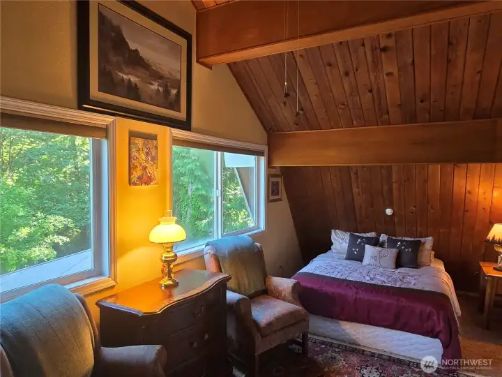 Upper bedroom comfortably fits 2 queen size beds.