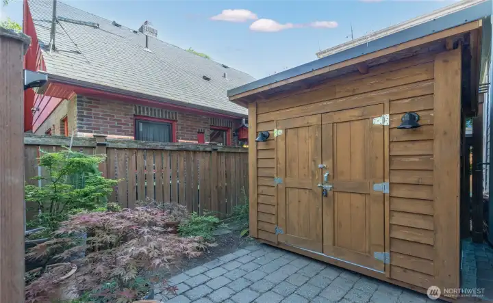 Private patio space, and ?Custom-built storage shed fully equipped with integrated bike racks (2025)