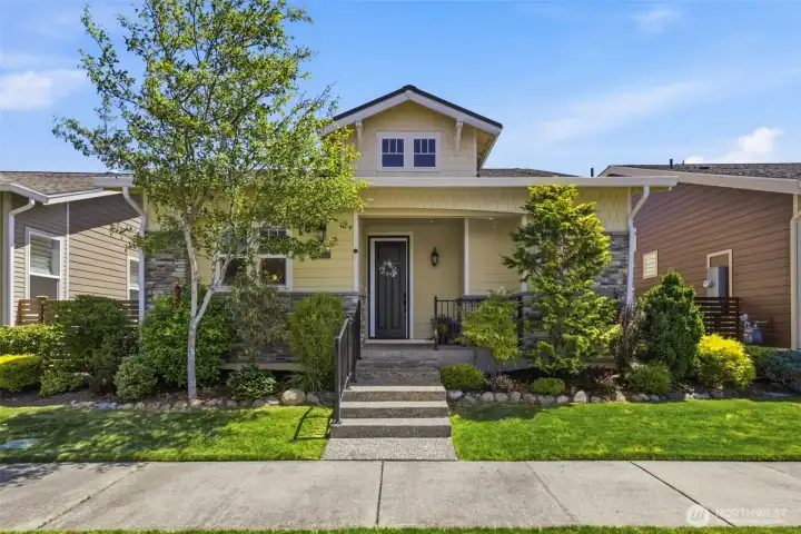 Front Exterior. Craftsman-style curb appeal with stone accents, a covered entry, and lush, professionally landscaped grounds. Front Exterior. Craftsman-style curb appeal with stone accents, a covered entry, and lush, professionally landscaped grounds.
