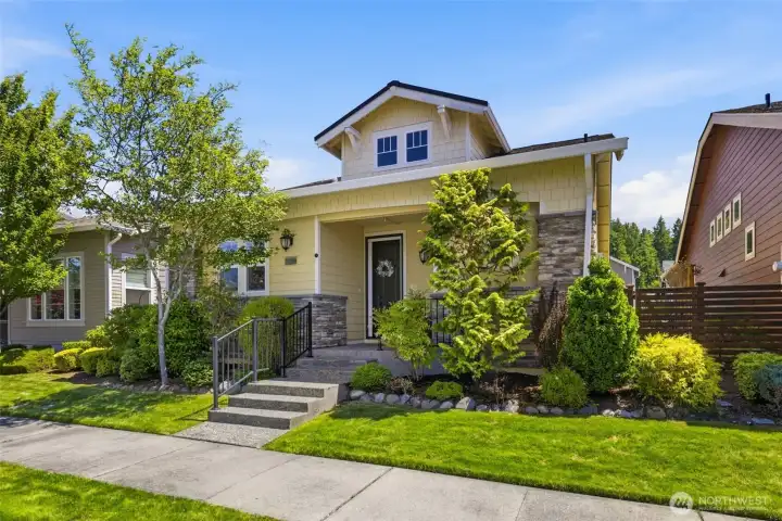 Front Exterior. Classic architectural details and layered landscaping create inviting curb appeal. Front Exterior. Classic architectural details and layered landscaping create inviting curb appeal.