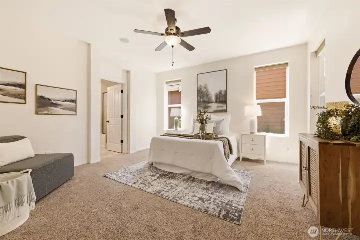 Primary Bedroom. A generous layout with plush carpet and a cozy sitting area provides a private retreat. Primary Bedroom. A generous layout with plush carpet and a cozy sitting area provides a private retreat.