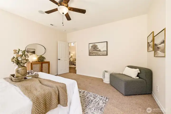 Primary Bedroom. A designated sitting nook adds extra comfort and flexible living space. Primary Bedroom. A designated sitting nook adds extra comfort and flexible living space.